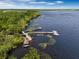 Lake access with multiple docks and small pavilion at 6923 Five Oaks Dr, St Cloud, FL 34773