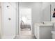 Clean bathroom with a shower/tub combo and a vanity with a mirror at 1337 Laramie Way, Haines City, FL 33844