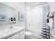 Clean bathroom, bathtub, shower, and updated vanity at 1337 Laramie Way, Haines City, FL 33844