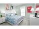 Charming bedroom with a full-size bed and llama-themed decor at 1337 Laramie Way, Haines City, FL 33844