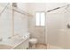 Small bathroom with shower, toilet, and a sink at 6000 Marthas Ln, Saint Cloud, FL 34771