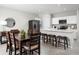Modern kitchen with white cabinets and stainless steel appliances at 1602 Minnesota Rd, Sumterville, FL 33585