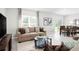 Bright living room with large windows and neutral color scheme at 1602 Minnesota Rd, Sumterville, FL 33585