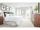 Spacious main bedroom with king bed and natural light from large windows at 1602 Minnesota Rd, Sumterville, FL 33585