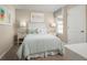 Charming bedroom with light green bedding and ice cream decor at 2310 Incandescent Way, South Daytona, FL 32119