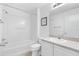 Updated bathroom with a shower/tub combo and vanity at 1052 Ridgeville Rd, The Villages, FL 32162
