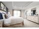 Spacious main bedroom with large window and en-suite bathroom access at 5100 Grand Teton Ct, Deland, FL 32724