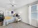 Charming bedroom with a double bed and plenty of natural light at 104 Sunset Way, Fruitland Park, FL 34731