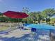 Inviting above ground pool with deck and patio furniture at 104 Sunset Way, Fruitland Park, FL 34731