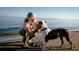 Personal and dog enjoying the beach at 113 Eagle Harbor Way, Daytona Beach, FL 32124