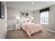 Light and airy bedroom with a peach comforter set at 1653 Laia Rd, Haines City, FL 33844