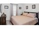 Spacious bedroom with large bed and window at 15138 Sw 50Th Avenue Rd, Ocala, FL 34473