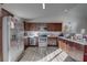 Kitchen with stainless steel appliances and wood cabinets at 167 Oak Cir, Ocala, FL 34472