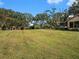 Large backyard with plenty of green space at 1910 E Pollock Rd, Lakeland, FL 33813