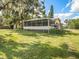 House exterior view from backyard at 1910 E Pollock Rd, Lakeland, FL 33813