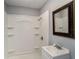 Clean bathroom with a shower/tub combo and a vanity at 1910 E Pollock Rd, Lakeland, FL 33813