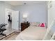 Cozy bedroom featuring a double bed and built-in shelving at 1910 E Pollock Rd, Lakeland, FL 33813