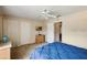 Bright bedroom with a double bed and built-in dresser at 216 Calabria Ave, Davenport, FL 33897