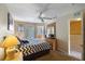 Main bedroom with a king-size bed and en-suite bathroom at 216 Calabria Ave, Davenport, FL 33897