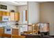 Kitchen with breakfast bar, view of dining area at 216 Calabria Ave, Davenport, FL 33897