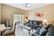 Living room with comfortable seating and access to patio at 216 Calabria Ave, Davenport, FL 33897