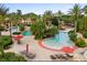 Relaxing pool area with lounge chairs and umbrellas at 216 Calabria Ave, Davenport, FL 33897