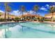 Community pool with a view of the clubhouse at 216 Calabria Ave, Davenport, FL 33897