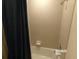 Modern tiled shower and tub combination at 5537 Misty Oak Cir, Davenport, FL 33837