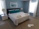 Bedroom with a king-size bed and white linens at 5537 Misty Oak Cir, Davenport, FL 33837
