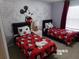 ' bedroom featuring Disney's Mickey Mouse theme at 5537 Misty Oak Cir, Davenport, FL 33837