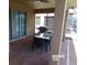 Outdoor patio area with a table, chairs, grill, and view of the pool at 5537 Misty Oak Cir, Davenport, FL 33837