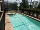 Private pool with a small jacuzzi and a paved patio area at 5537 Misty Oak Cir, Davenport, FL 33837