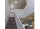 Staircase leading to the upper floor at 5537 Misty Oak Cir, Davenport, FL 33837