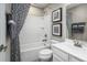 Clean bathroom with a bathtub, shower, and modern vanity at 10865 Sw 73Rd Ct, Ocala, FL 34476