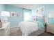 Light and airy bedroom with a queen-size bed and cheerful decor at 2117 Aibonito Cir, Clermont, FL 34711