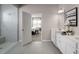 Elegant bathroom with double vanity and walk-in shower at 7416 Sw 107Th Ln, Ocala, FL 34476