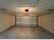 Spacious garage with an automatic garage door opener at 16150 Sw 44Th Cir, Ocala, FL 34473