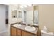 Double vanity bathroom with shower and tile floor at 5631 Superior Dr, Lakeland, FL 33805