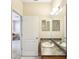 Bathroom features dual vanity and updated fixtures at 5631 Superior Dr, Lakeland, FL 33805