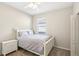 Bedroom with white furniture and ceiling fan at 5631 Superior Dr, Lakeland, FL 33805