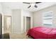 Bedroom with double bed, closet, and window at 5631 Superior Dr, Lakeland, FL 33805