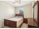 Bedroom with wood furniture and ceiling fan at 5631 Superior Dr, Lakeland, FL 33805