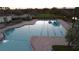 Large community pool with plenty of lounge chairs at 5631 Superior Dr, Lakeland, FL 33805