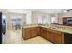 Kitchen features granite countertops and breakfast bar at 5631 Superior Dr, Lakeland, FL 33805