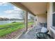 Enjoy lake views from this screened lanai, complete with seating at 5631 Superior Dr, Lakeland, FL 33805