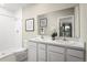 Bathroom with double vanity, shower, and toilet at 1657 Laia Rd, Haines City, FL 33844