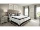 Main bedroom with king-size bed and neutral decor at 1657 Laia Rd, Haines City, FL 33844
