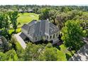 Aerial view of house, landscaping, and golf course at 3923 Nw 85Th Ter, Ocala, FL 34482