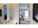 Bedroom with ensuite bathroom and modern decor at 1341 Arklow Cir, Ormond Beach, FL 32174