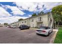 Building exterior with parking and landscaping at 5817 La Costa Dr # S, Orlando, FL 32807